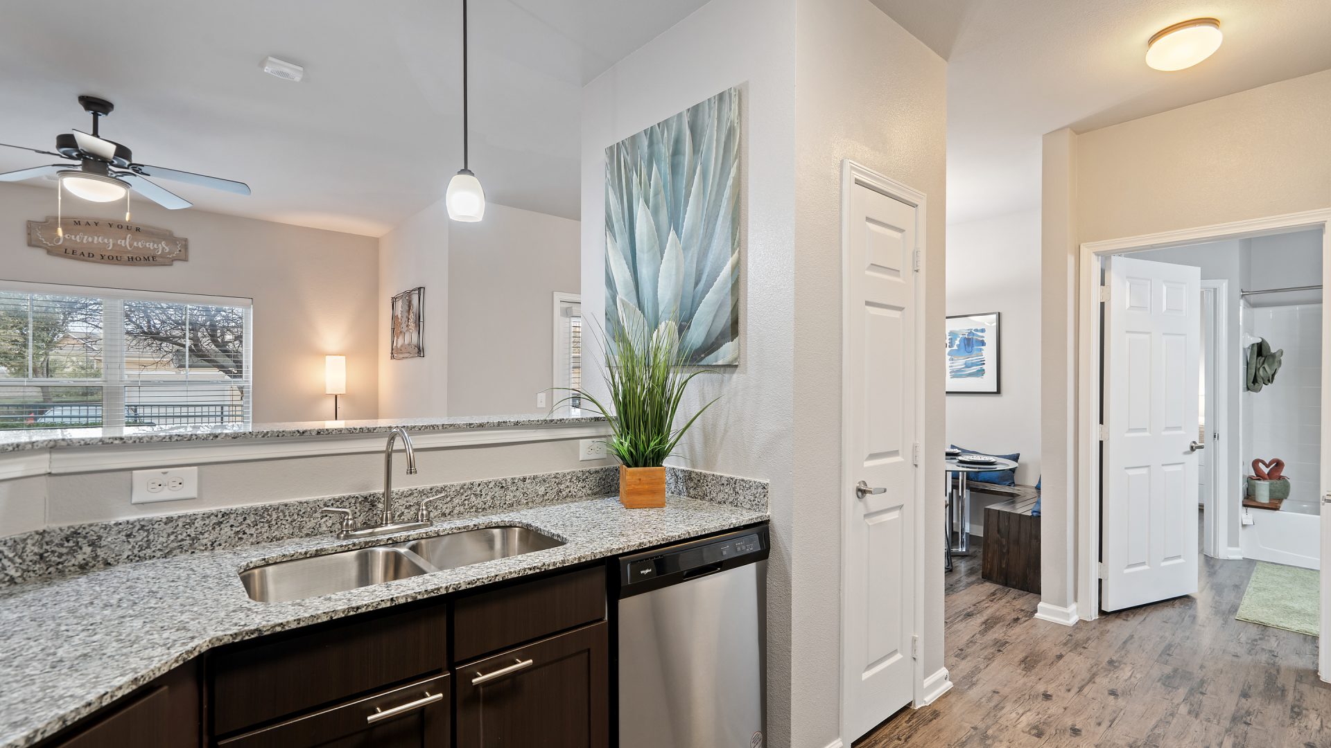 kitchen with granite countertops and stainless steel appliances at The Creekside at Kenneys Fort